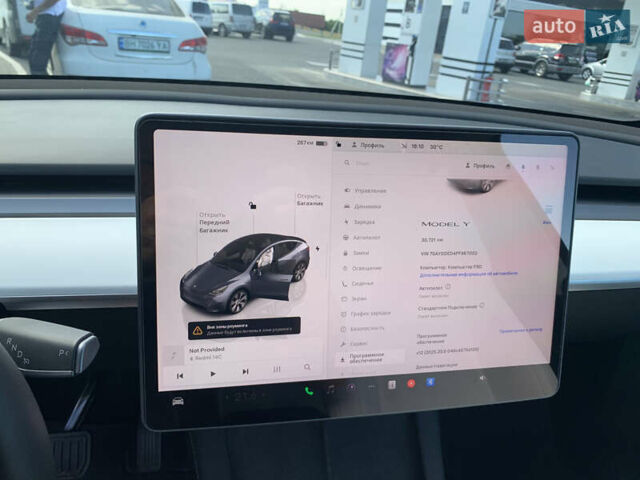 Сірий Тесла Model Y, об'ємом двигуна 0 л та пробігом 31 тис. км за 24800 $, фото 18 на Automoto.ua