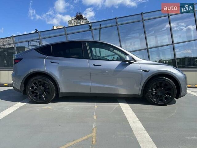 Серый Тесла Model Y, объемом двигателя 0 л и пробегом 11 тыс. км за 48500 $, фото 5 на Automoto.ua