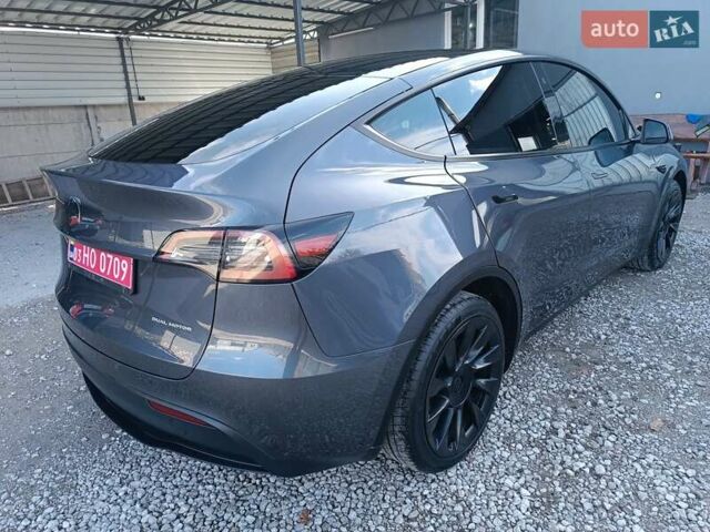 Серый Тесла Model Y, объемом двигателя 0 л и пробегом 43 тыс. км за 33333 $, фото 1 на Automoto.ua