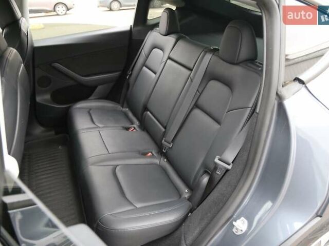 Серый Тесла Model Y, объемом двигателя 0 л и пробегом 50 тыс. км за 33900 $, фото 15 на Automoto.ua