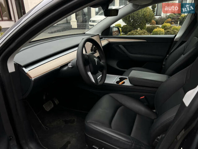 Серый Тесла Model Y, объемом двигателя 0 л и пробегом 52 тыс. км за 27499 $, фото 15 на Automoto.ua