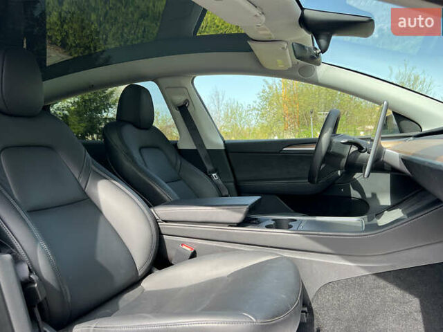 Серый Тесла Model Y, объемом двигателя 0 л и пробегом 16 тыс. км за 28999 $, фото 7 на Automoto.ua