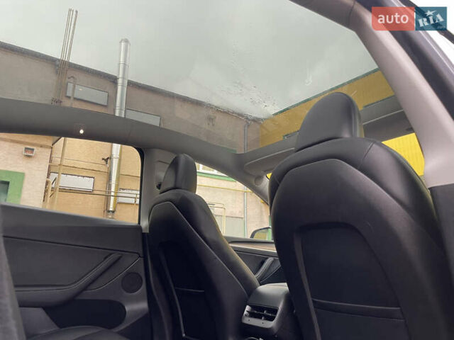 Сірий Тесла Model Y, об'ємом двигуна 0 л та пробігом 9 тис. км за 28500 $, фото 50 на Automoto.ua