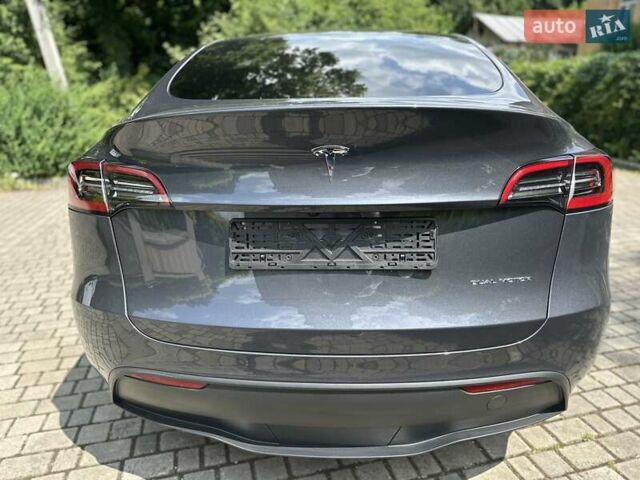 Серый Тесла Model Y, объемом двигателя 0 л и пробегом 55 тыс. км за 25100 $, фото 28 на Automoto.ua