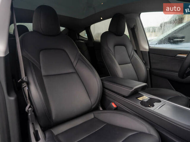 Серый Тесла Model Y, объемом двигателя 0 л и пробегом 61 тыс. км за 32500 $, фото 23 на Automoto.ua