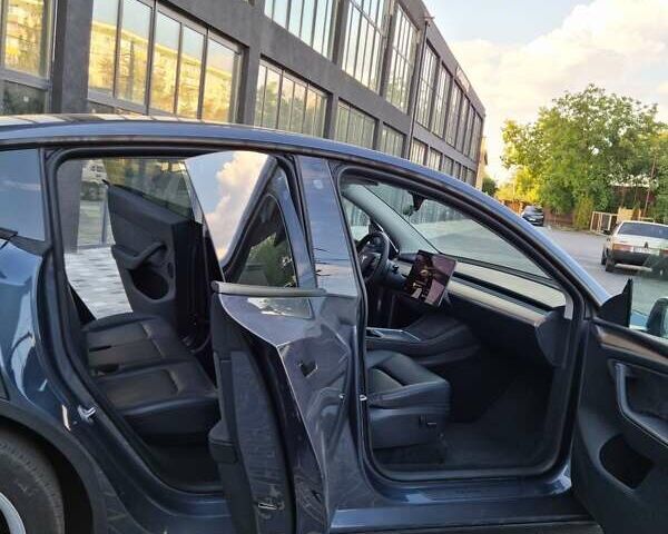 Серый Тесла Model Y, объемом двигателя 0 л и пробегом 28 тыс. км за 34999 $, фото 27 на Automoto.ua