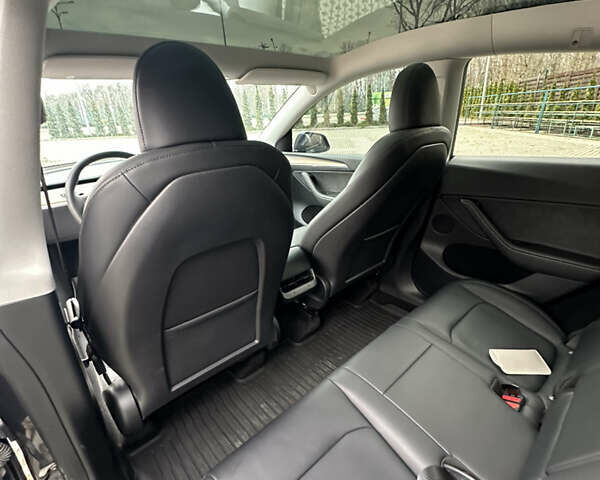Серый Тесла Model Y, объемом двигателя 0 л и пробегом 22 тыс. км за 32000 $, фото 71 на Automoto.ua
