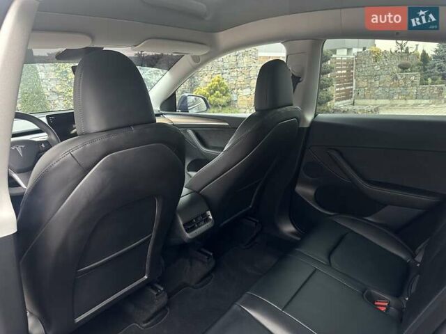 Серый Тесла Model Y, объемом двигателя 0 л и пробегом 7 тыс. км за 29950 $, фото 20 на Automoto.ua