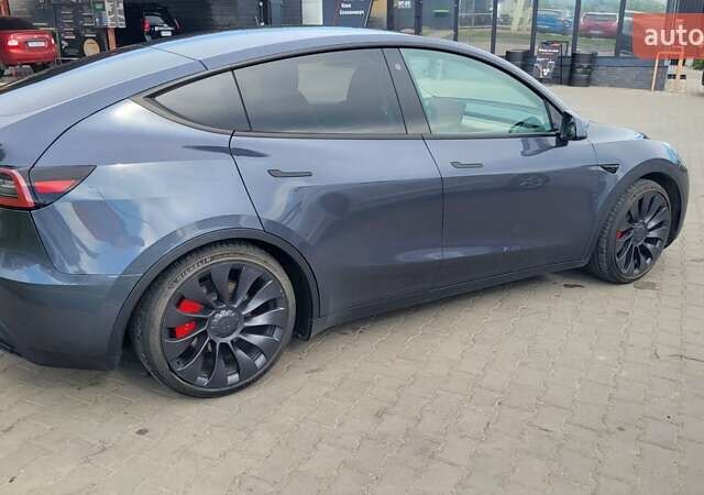 Серый Тесла Model Y, объемом двигателя 0 л и пробегом 18 тыс. км за 29500 $, фото 1 на Automoto.ua