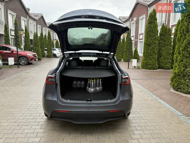 Серый Тесла Model Y, объемом двигателя 0 л и пробегом 18 тыс. км за 28500 $, фото 4 на Automoto.ua