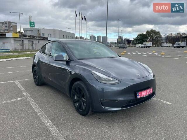 Серый Тесла Model Y, объемом двигателя 0 л и пробегом 51 тыс. км за 28900 $, фото 5 на Automoto.ua