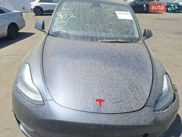 Серый Тесла Model Y, объемом двигателя 0 л и пробегом 29 тыс. км за 27000 $, фото 2 на Automoto.ua
