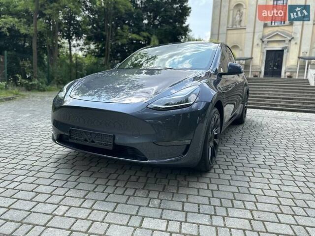 Серый Тесла Model Y, объемом двигателя 0 л и пробегом 55 тыс. км за 25100 $, фото 20 на Automoto.ua
