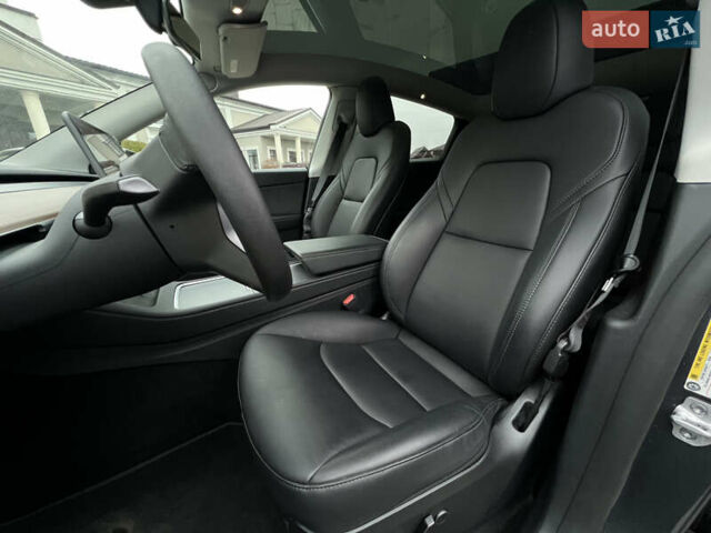 Серый Тесла Model Y, объемом двигателя 0 л и пробегом 52 тыс. км за 27499 $, фото 16 на Automoto.ua