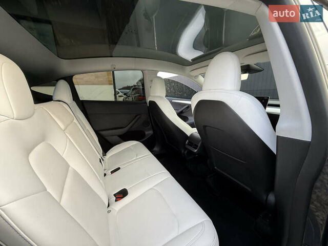 Сірий Тесла Model Y, об'ємом двигуна 0 л та пробігом 28 тис. км за 27900 $, фото 46 на Automoto.ua