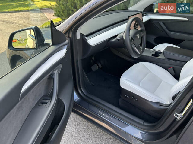 Серый Тесла Model Y, объемом двигателя 0 л и пробегом 55 тыс. км за 29500 $, фото 7 на Automoto.ua