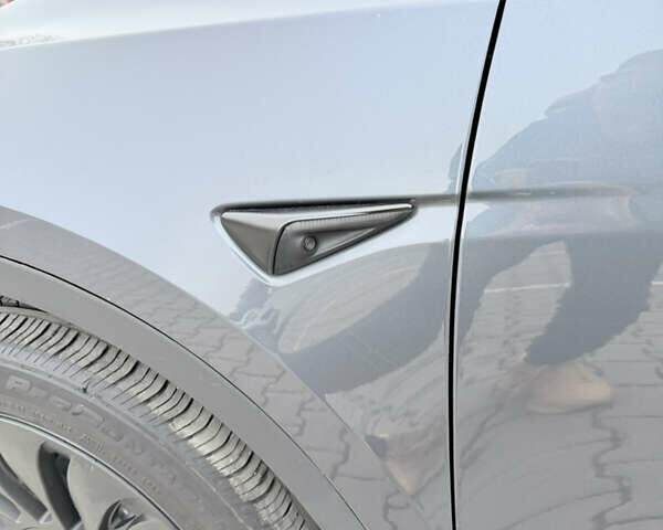 Серый Тесла Model Y, объемом двигателя 0 л и пробегом 64 тыс. км за 27300 $, фото 12 на Automoto.ua