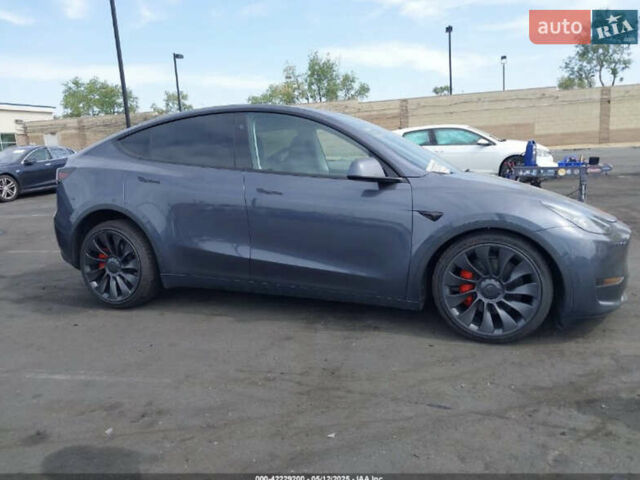 Серый Тесла Model Y, объемом двигателя 0 л и пробегом 29 тыс. км за 27500 $, фото 4 на Automoto.ua