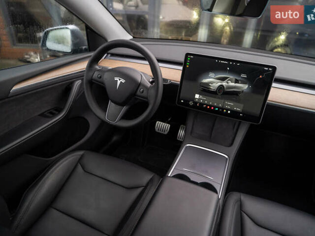 Серый Тесла Model Y, объемом двигателя 0 л и пробегом 61 тыс. км за 32500 $, фото 20 на Automoto.ua