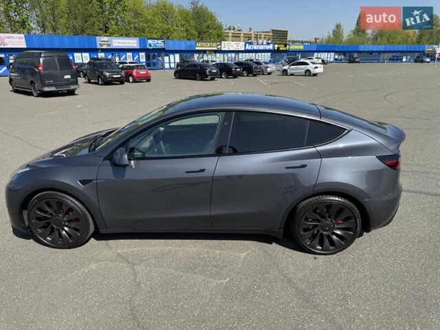 Серый Тесла Model Y, объемом двигателя 0 л и пробегом 28 тыс. км за 29000 $, фото 22 на Automoto.ua