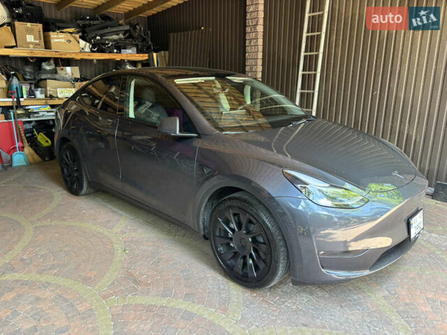 Серый Тесла Model Y, объемом двигателя 0 л и пробегом 32 тыс. км за 33500 $, фото 2 на Automoto.ua