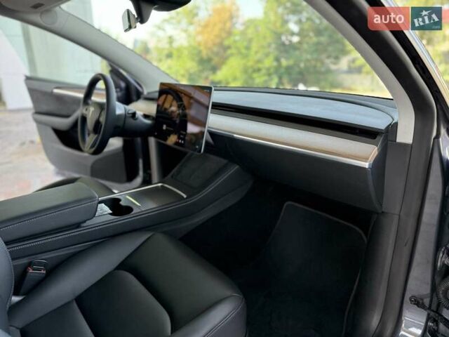 Серый Тесла Model Y, объемом двигателя 0 л и пробегом 16 тыс. км за 28900 $, фото 22 на Automoto.ua