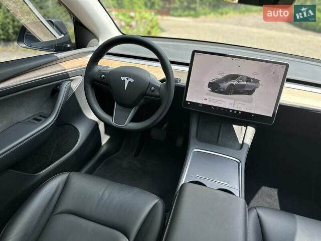 Серый Тесла Model Y, объемом двигателя 0 л и пробегом 55 тыс. км за 25100 $, фото 39 на Automoto.ua