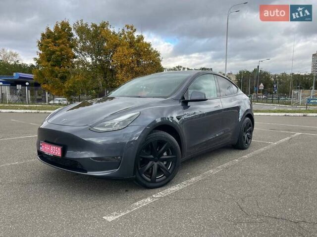 Серый Тесла Model Y, объемом двигателя 0 л и пробегом 51 тыс. км за 28900 $, фото 1 на Automoto.ua