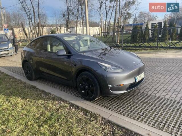 Серый Тесла Model Y, объемом двигателя 0 л и пробегом 42 тыс. км за 25990 $, фото 1 на Automoto.ua