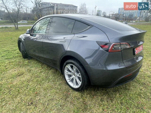 Серый Тесла Model Y, объемом двигателя 0 л и пробегом 41 тыс. км за 27300 $, фото 3 на Automoto.ua