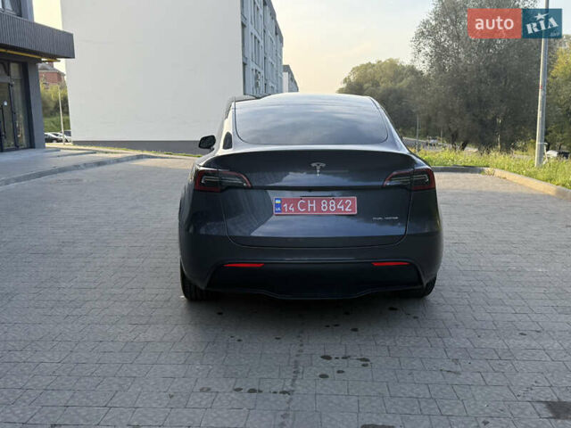 Серый Тесла Model Y, объемом двигателя 0 л и пробегом 49 тыс. км за 27000 $, фото 5 на Automoto.ua