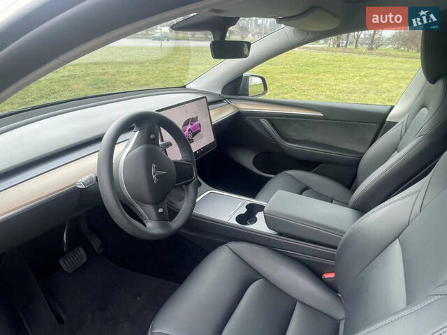 Серый Тесла Model Y, объемом двигателя 0 л и пробегом 41 тыс. км за 27300 $, фото 12 на Automoto.ua