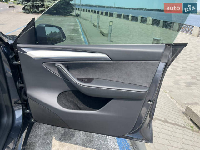 Серый Тесла Model Y, объемом двигателя 0 л и пробегом 24 тыс. км за 30500 $, фото 12 на Automoto.ua