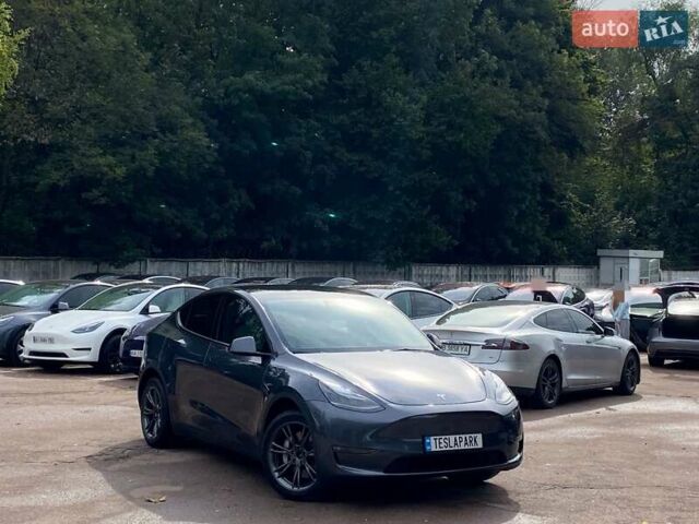 Сірий Тесла Model Y, об'ємом двигуна 0 л та пробігом 51 тис. км за 33999 $, фото 1 на Automoto.ua
