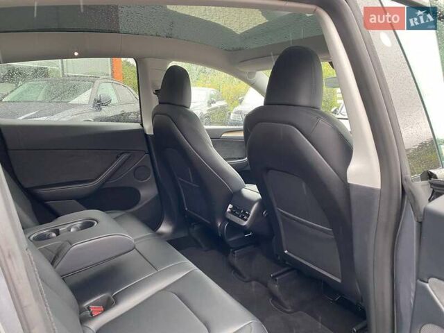 Серый Тесла Model Y, объемом двигателя 0 л и пробегом 30 тыс. км за 31700 $, фото 20 на Automoto.ua