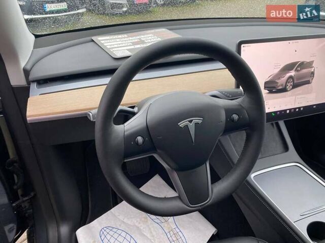 Серый Тесла Model Y, объемом двигателя 0 л и пробегом 30 тыс. км за 31700 $, фото 11 на Automoto.ua