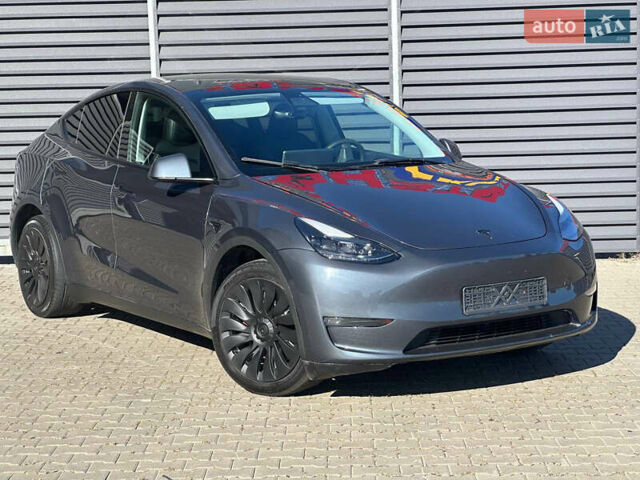 Серый Тесла Model Y, объемом двигателя 0 л и пробегом 93 тыс. км за 27900 $, фото 4 на Automoto.ua