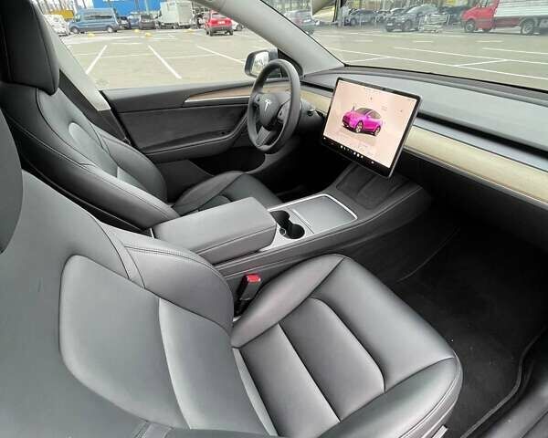 Серый Тесла Model Y, объемом двигателя 0 л и пробегом 51 тыс. км за 28900 $, фото 17 на Automoto.ua