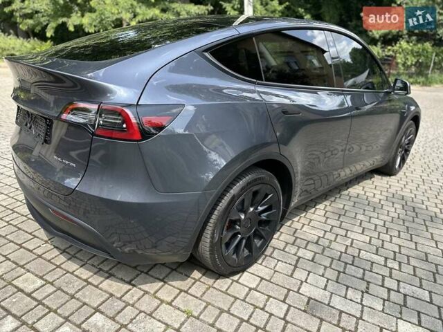 Серый Тесла Model Y, объемом двигателя 0 л и пробегом 55 тыс. км за 25100 $, фото 24 на Automoto.ua