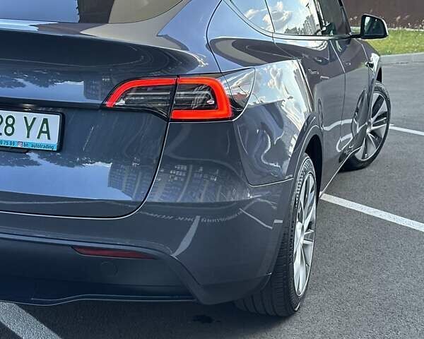 Сірий Тесла Model Y, об'ємом двигуна 0 л та пробігом 28 тис. км за 24400 $, фото 4 на Automoto.ua