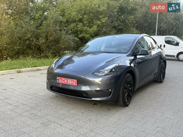 Серый Тесла Model Y, объемом двигателя 0 л и пробегом 49 тыс. км за 27000 $, фото 1 на Automoto.ua