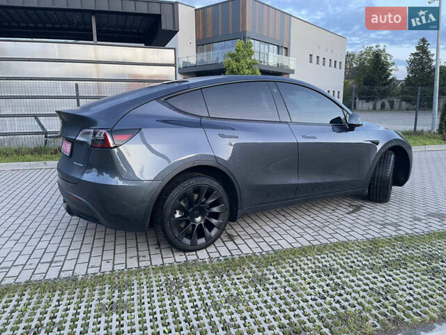 Серый Тесла Model Y, объемом двигателя 0 л и пробегом 107 тыс. км за 27000 $, фото 3 на Automoto.ua