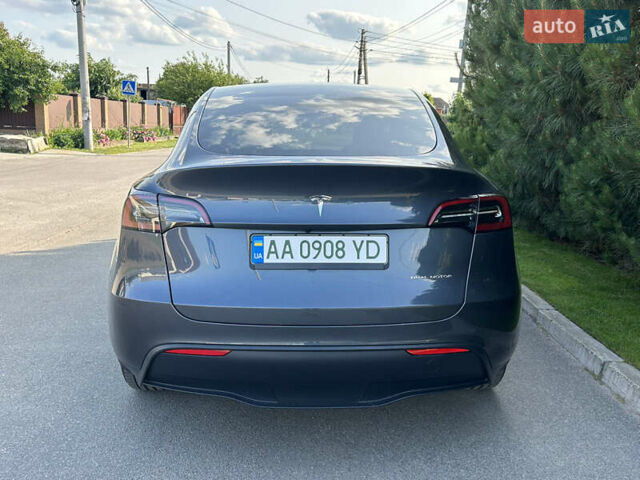 Серый Тесла Model Y, объемом двигателя 0 л и пробегом 55 тыс. км за 29500 $, фото 3 на Automoto.ua