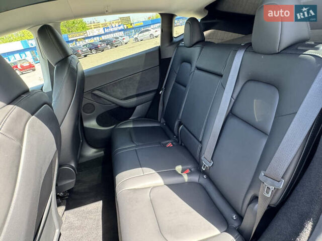 Серый Тесла Model Y, объемом двигателя 0 л и пробегом 28 тыс. км за 29000 $, фото 38 на Automoto.ua