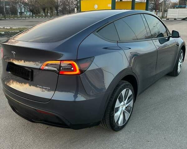Серый Тесла Model Y, объемом двигателя 0 л и пробегом 65 тыс. км за 26300 $, фото 7 на Automoto.ua