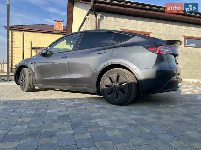 Серый Тесла Model Y, объемом двигателя 0 л и пробегом 25 тыс. км за 29000 $, фото 4 на Automoto.ua