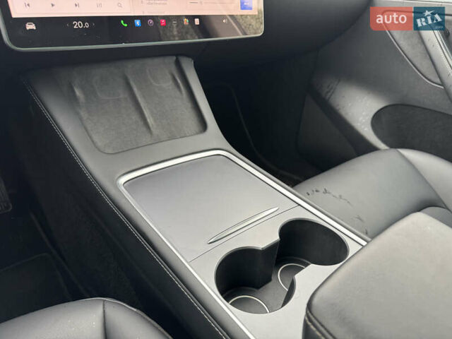 Серый Тесла Model Y, объемом двигателя 0 л и пробегом 66 тыс. км за 27900 $, фото 21 на Automoto.ua