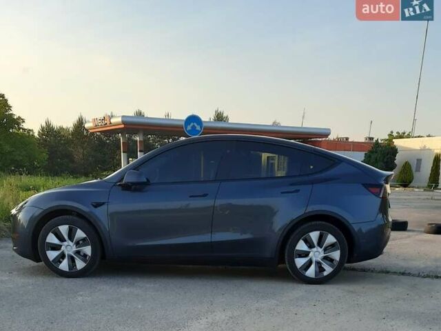 Серый Тесла Model Y, объемом двигателя 0 л и пробегом 41 тыс. км за 27000 $, фото 1 на Automoto.ua