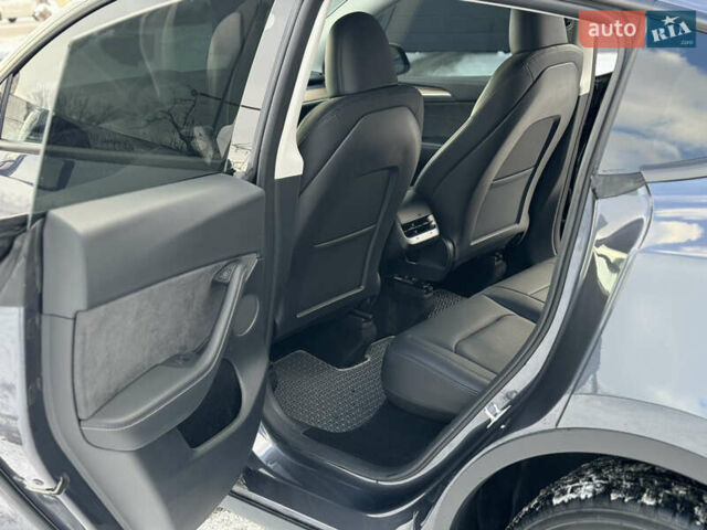 Серый Тесла Model Y, объемом двигателя 0 л и пробегом 26 тыс. км за 33500 $, фото 21 на Automoto.ua