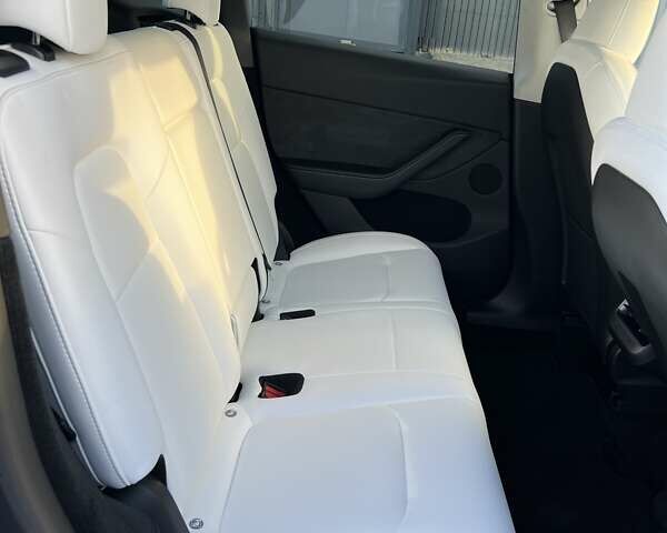 Серый Тесла Model Y, объемом двигателя 0 л и пробегом 22 тыс. км за 28999 $, фото 13 на Automoto.ua